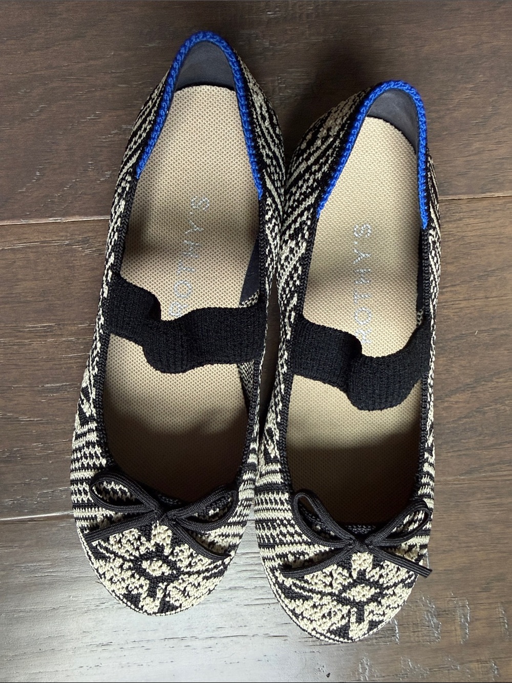 Rothy's Black and Cream Knit Ballet Flats with Blue Trim